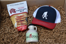 Load image into Gallery viewer, Bigfoot Embroidered USA Trucker Hat with Pint of "Wood Fired" Syrup and Original Polly's Pancake mix gift box
