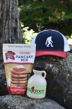 Load image into Gallery viewer, Bigfoot Embroidered USA Trucker Hat with Pint of "Wood Fired" Syrup and Original Polly's Pancake mix gift box
